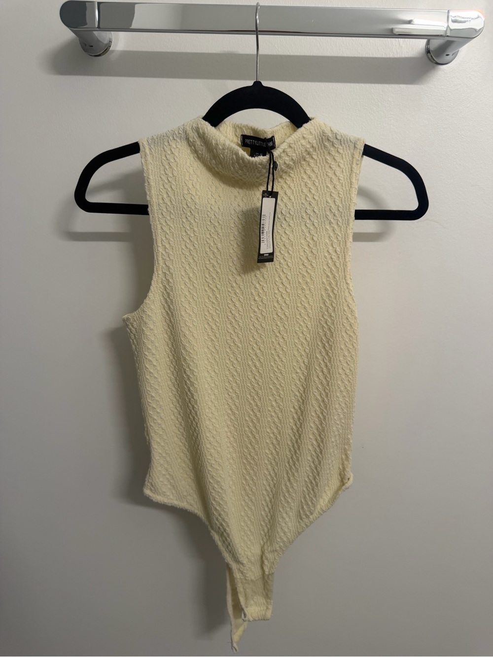 PrettyLittleThing Cream Textured Mock Neck Sleeveless Bodysuit